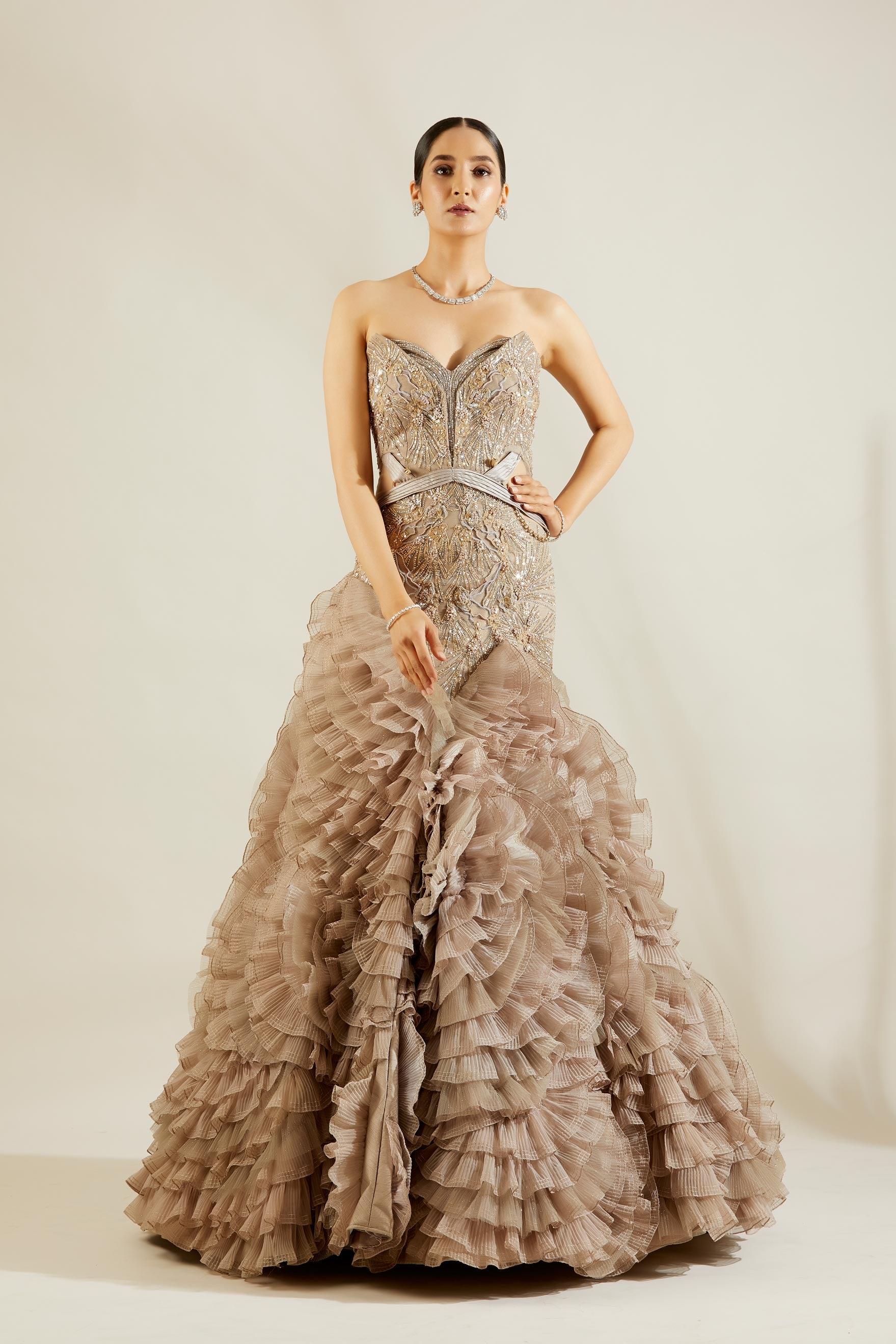 Daisy Shah in Abalone Grey and Gold Evening Gown