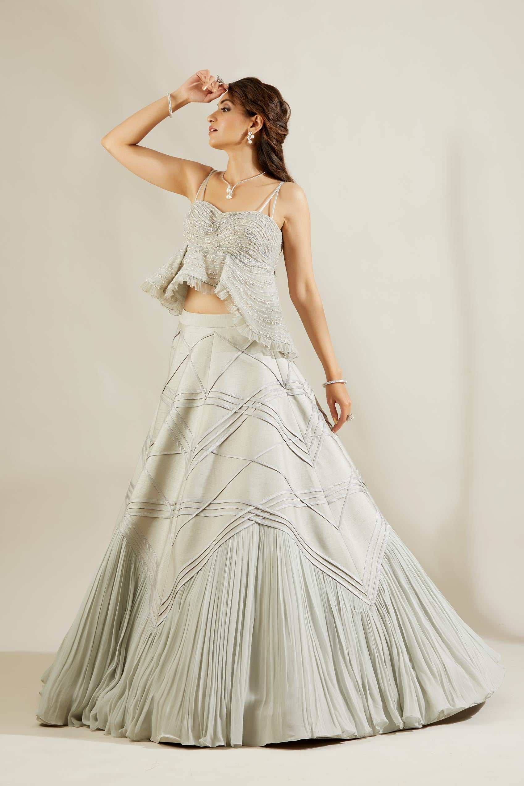 Powder blue lehenga with peplum blouse